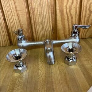 American Standard Silver Wall-Mount Faucet